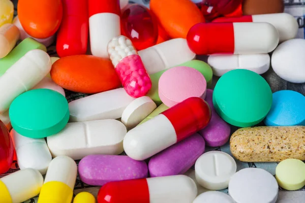 Pilules et argent - antécédents médicaux des entreprises — Photo