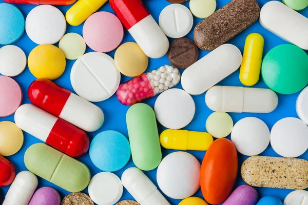 Heap of pills - medical background — Stock Photo, Image