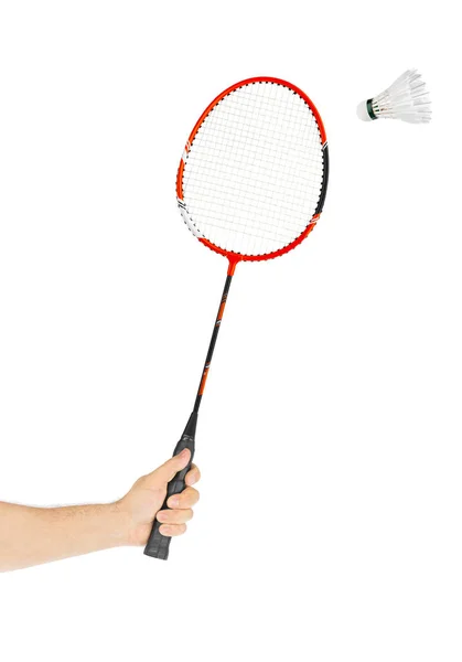 Mão com badminton raquete e pena shuttlecock — Fotografia de Stock