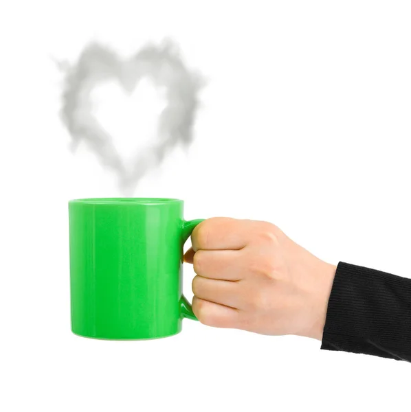 Hand with cup and steam like a heart — Stock Photo, Image