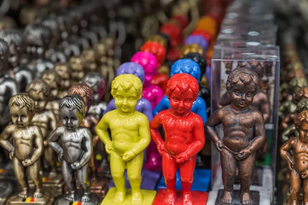 Pissing Boy (Manneken Pis) toys in souvenir shop - Brussels Belgium — Stock Image Pissing Boy (Manneken Pis) toys in souvenir shop - Brussels Belgium Stock Photo