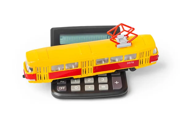 Taschenrechner Und Spielzeug Straßenbahn Isoliert Auf Weißem Hintergrund — Stockfoto