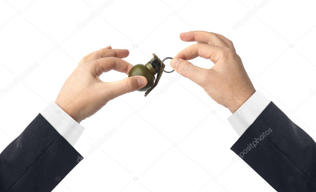Hand pulls a check from a grenade isolated on white background