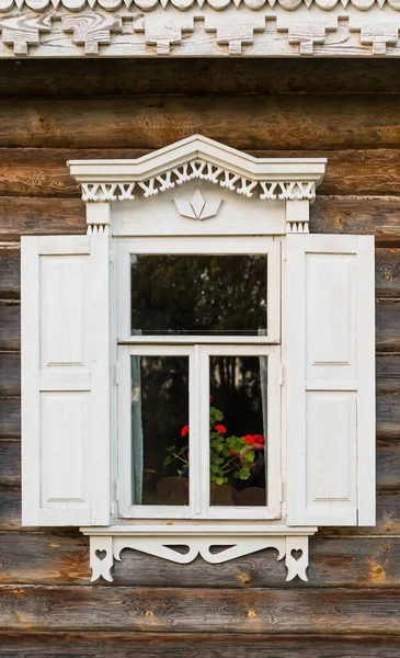 Window of old russian wooden house - architecture background