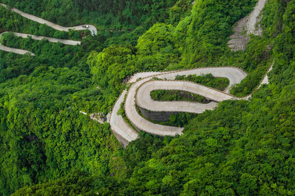 Mountains road in Tianmenshan nature park - China - travel background