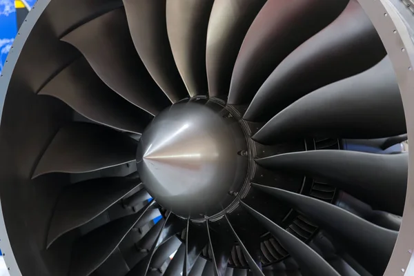 Close-up of a large jet engine turbine blades