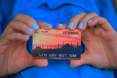 ISTANBUL, TURKEY - AUGUST 25, 2019: Istanbul card in female hands