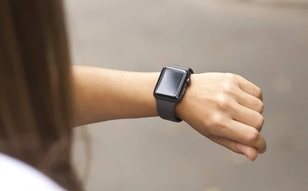 Smart watch on the woman\'s hand
