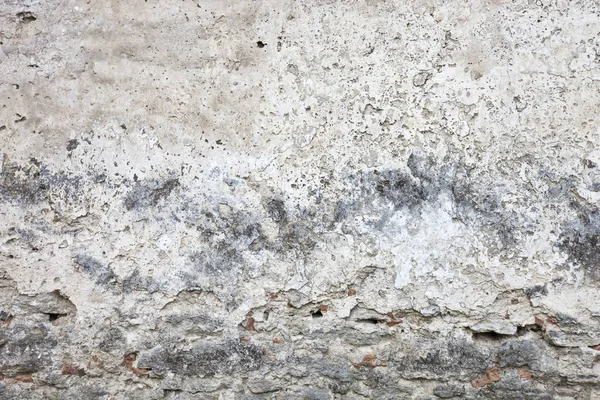 Vanhennettu seinä tehty tiilistä ja sementistä — kuvapankkivalokuva