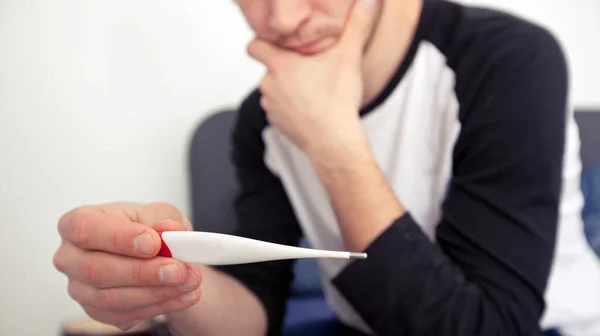 Man Checking His Temperature Lying Bed Looking Thermometer — Stock Photo, Image