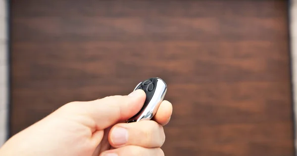 Man Opening Garage Door Remote Controller — Stock Photo, Image