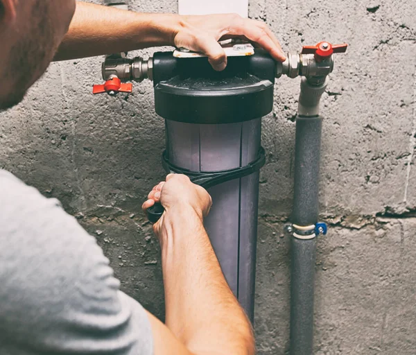 Plumber Repairing Water Filter Basement — Stock Photo, Image