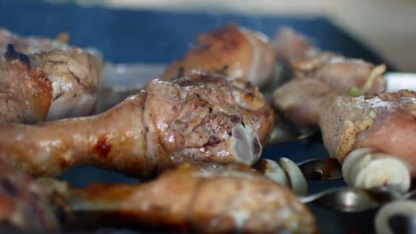 Grilled chicken on the grill. Chicken cooking on a barbeque. Chicken meat cooking on a barbecue grill. Outdoor cooking. — Stock Video