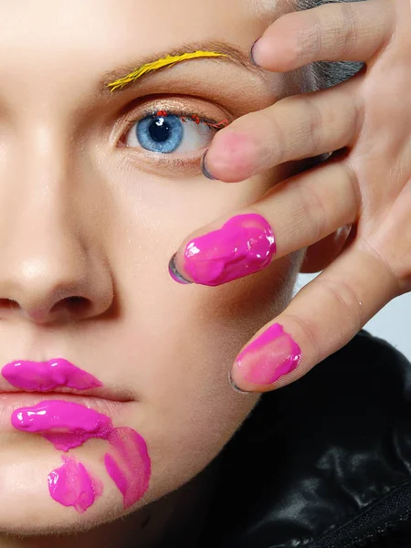 Young woman putting some special effects makeup on face — Stock Photo, Image