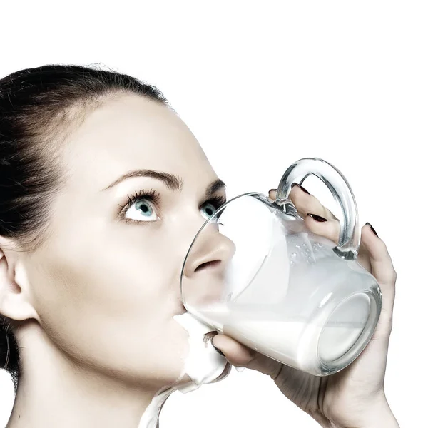 Portrait of a young woman with drops of milk on her — Stock Photo, Image