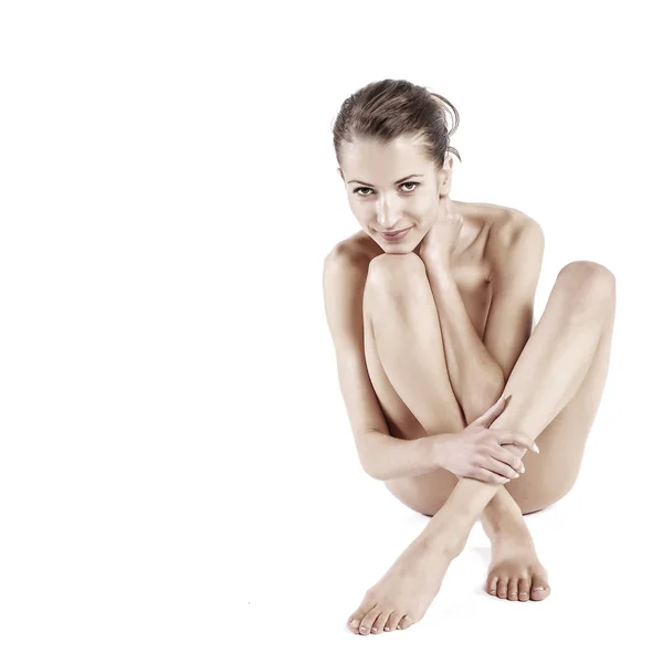Donna nuda seduta su un pavimento — Foto Stock