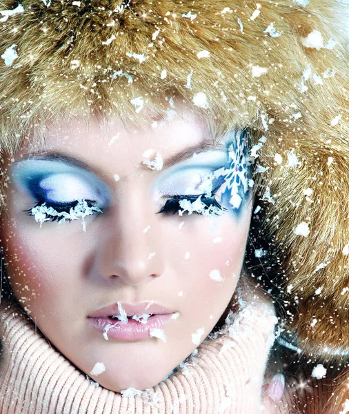 Beautiful woman with bright makeup. Fantasy girl portrait. Winter fairy portrait. Stock Photo