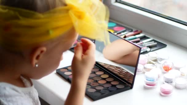 Beautiful Little Girl Mirror Makes Herself Make — Stock Video