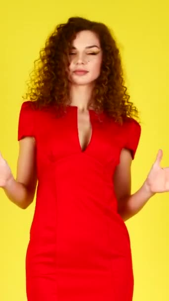 Beautiful young woman in red dress dancing. 4k. — Stock Video