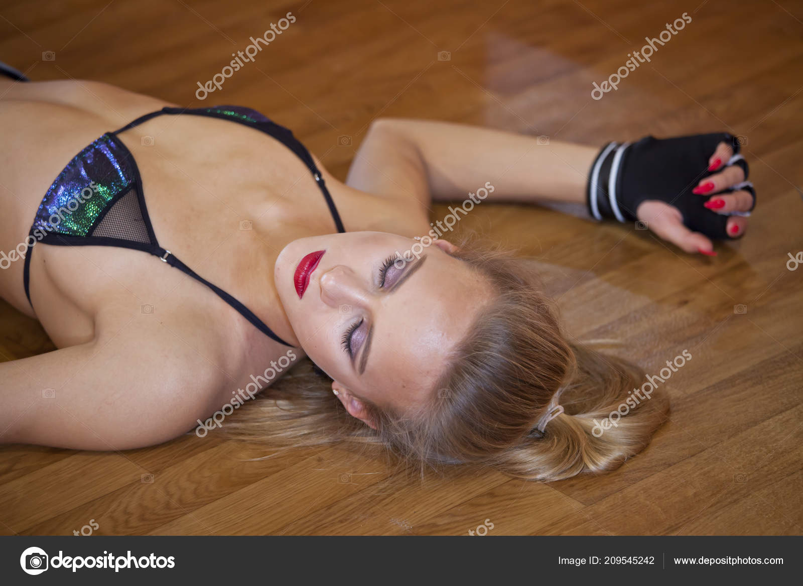 Beautiful Young Unconscious Knocked Out Woman Stock Photo