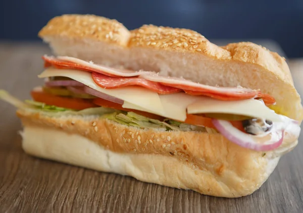 Close up of fresh sandwich snack in fast food restaurant menu.Street food dish close up.Tasty dinner in cafe.Enjoy delicious fastfood with natural ingredients & sauce