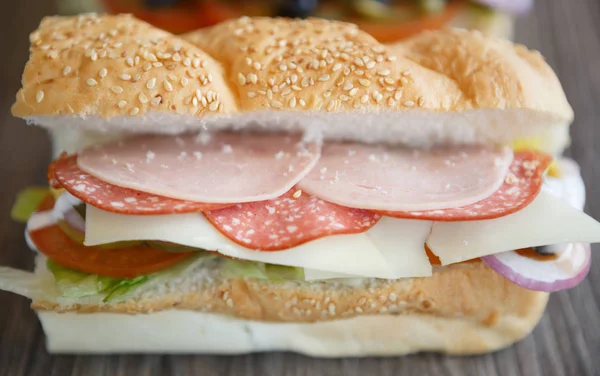 Close up of fresh sandwich snack in fast food restaurant menu.Street food dish close up.Tasty dinner in cafe.Enjoy delicious fastfood with natural ingredients & sauce