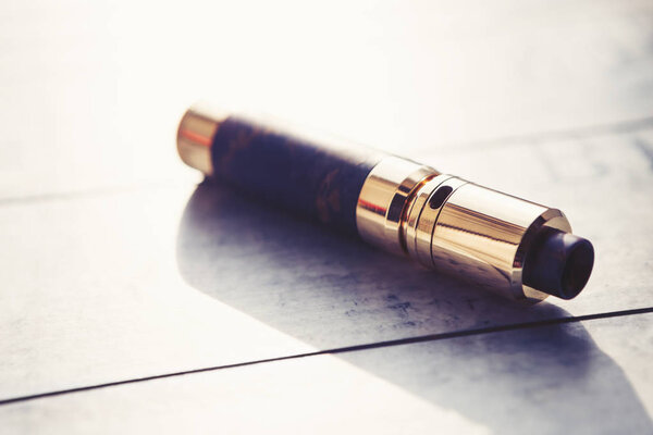 Modern electronic mech mod vaping devices.New vaporizer e-cig gadget to vape glycerin e-liquid.Quit smoking nicotine cigarette, start vaping safe ecig vape.Mechmod vaporizing device
