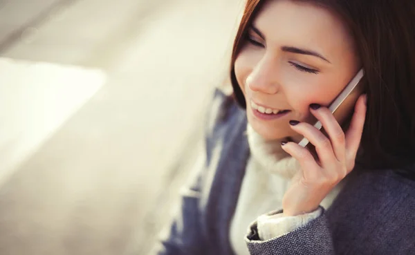 Portrait Happy Young Brunette Girl Grey Coat Talking Phone Outdoors — Stock Photo, Image