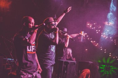 MOSCOW - 04 APRIL, 2015: Outlawz (former band of Tupac 2Pac Shakur) performing live concert in Russia at Skazka Bar clipart