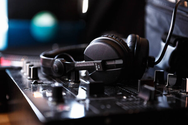 MOSCOW - 26 MARCH,2017: High quality Sennheiser dj headphones to listen & mix music from vinyl records.Powerhouse vinyl market sale of audio records with music for djs