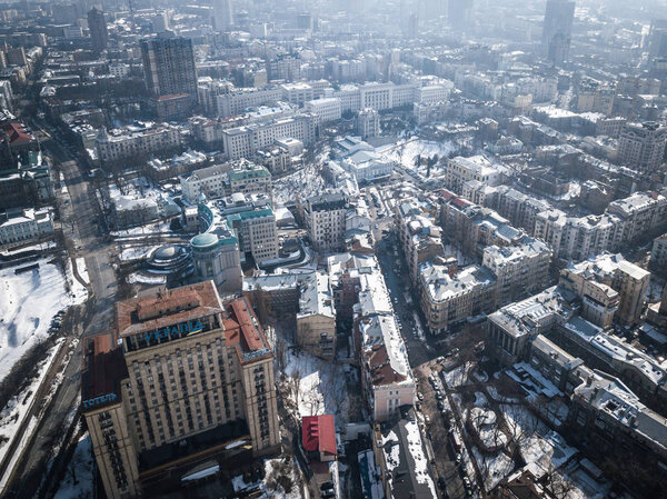 KIEV, UKRAINE -1 1 MARCH, 2018: Maidan Nezalezhnosti square in Kyiv. Aerial drone photo of center of Ukrainian capital city in cold winter day .Popular tourist area. Quadrocopter overhead photo