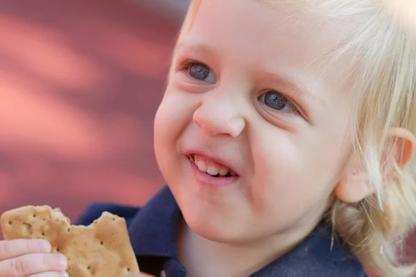 Portrait Cutest Blond Baby Boy Eating Tasty Cookie Playground — Stock Photo, Image