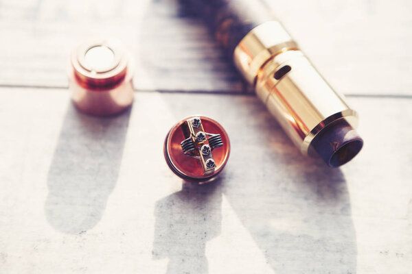 Modern electronic mech mod vaping device spare parts,repair service.Popular vaporizer e-cig gadget to vape glycerin e-liquid.Disassemble vaper device.Replacement coil head,replace wire. 