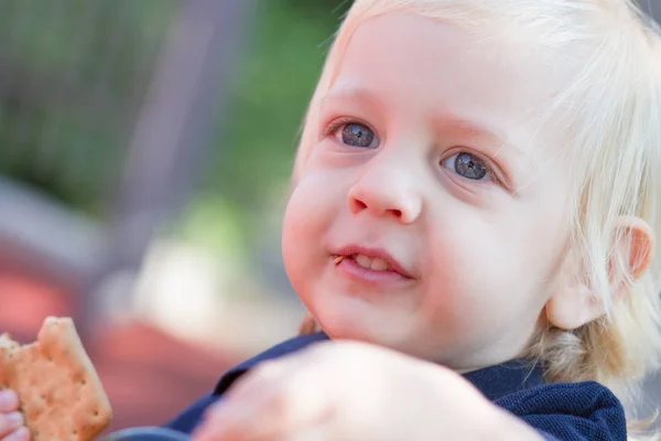 Portrait Cutest Blond Baby Boy Eating Tasty Cookie Playground — Stock Photo, Image