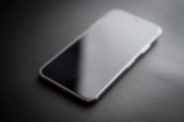 Mariupol, Ukraine - 27 Ekim, 2017: yeni Iphone X modeli yakın çekim. Modern hareket eden telefon ile değmek perde ve çift kamera lens. Trendy Apple Iphone 10 