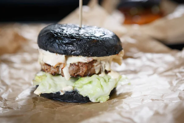 Big Tasty Black Burger Lettuce Salad Leaves White Sauce Pork — Stock Photo, Image