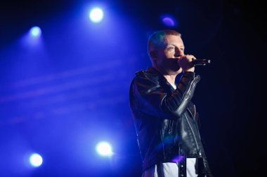MOSCOW - 7 JUNE, 2016: Concert of Macklemore and Ryan Lewis rap band at outdoor summer music festival Lastochka. clipart