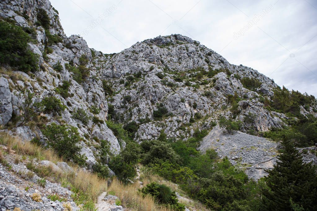 High rocky mountains in National Park Biokovo in Croatia.Beautiful natural view.Go hiking in popular tourist destination