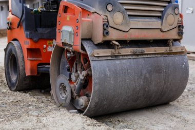Makarska Riviera, Croatia - 1 JULY,2017: Professional asphalt roller machine on the road construction site. Industrial vehicle for highway asphalting