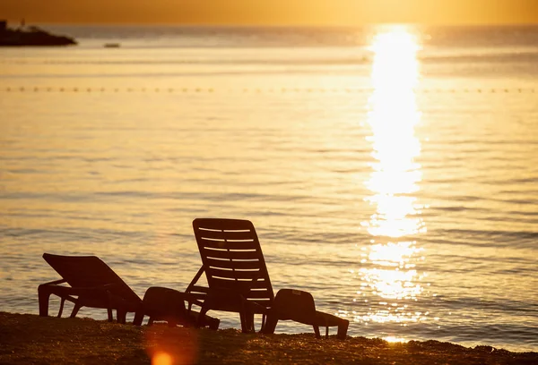 Comfortable Sunbeds Beach Sunset Golden Hour Lighting Travel Destination Background — стоковое фото