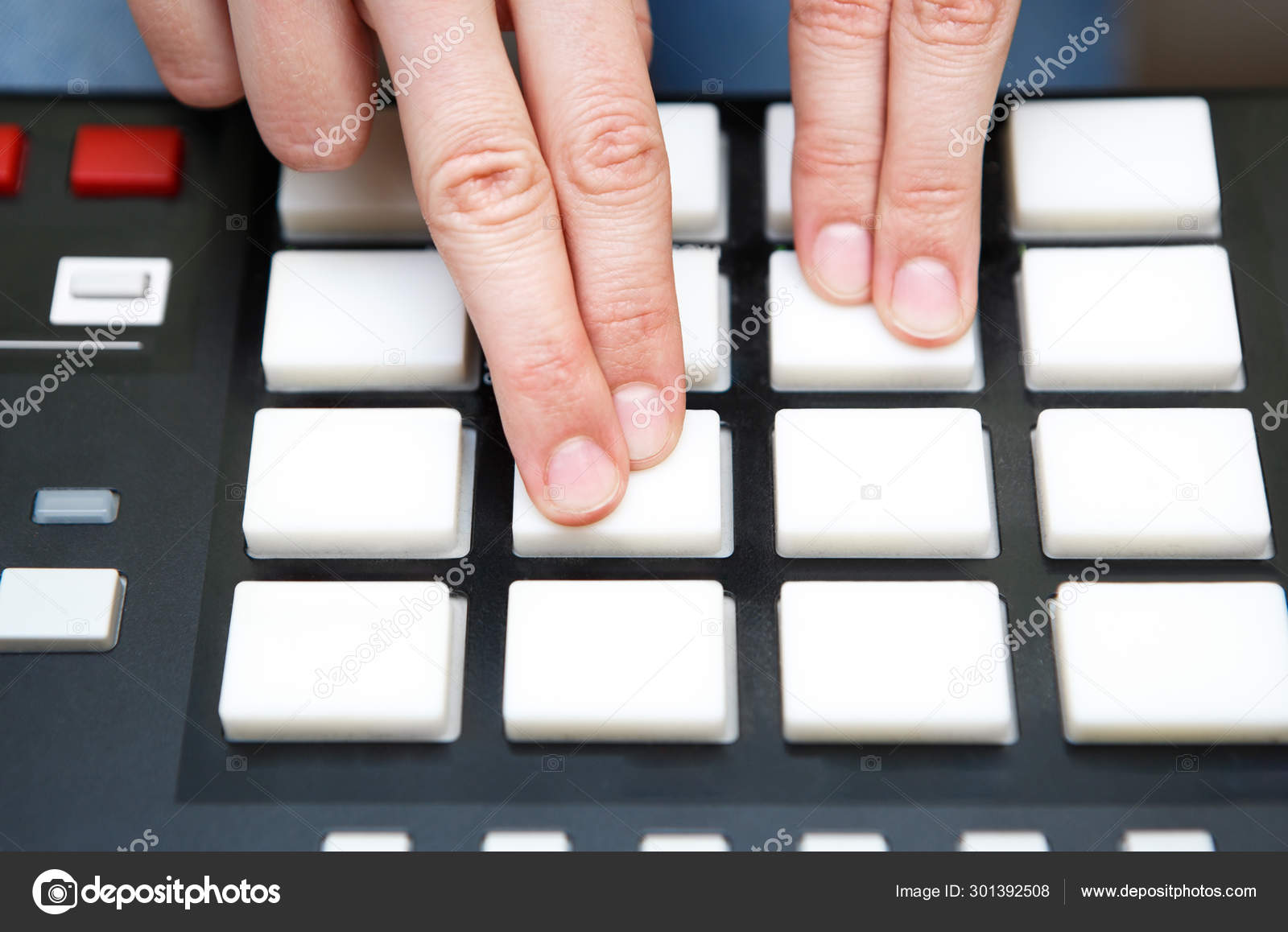 Hip hop beat maker producing new beats with midi controller Stock Photo by ©hurricanehank 301392508