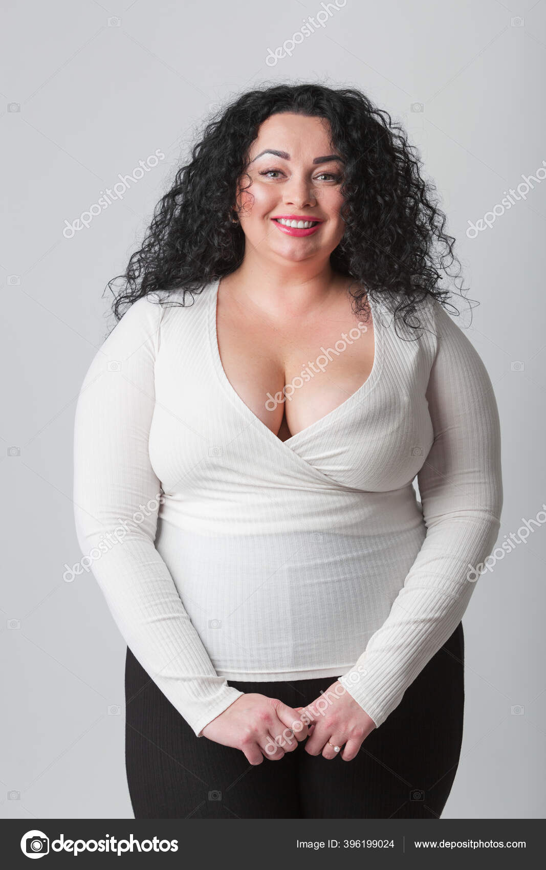 Beautiful Size Woman Curly Dark Hair Good Looking Overweight Girl Stock  Photo by ©hurricanehank 396199024