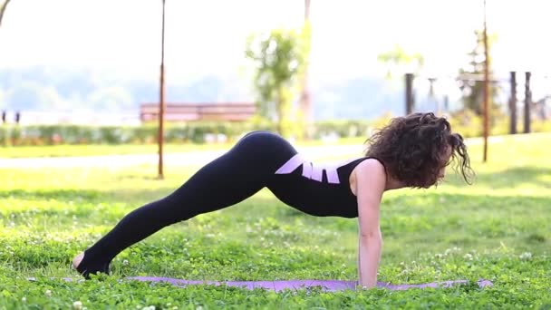 Curly Young Woman Yoga Body Suit Exercising Mat — Stock Video