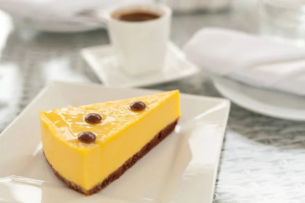Slice of delicious mango cheesecake