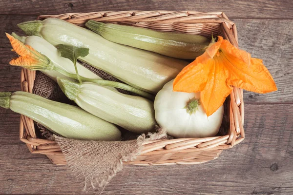 Fresh green zucchini with slice isolated on white background — Stock Photo, Image