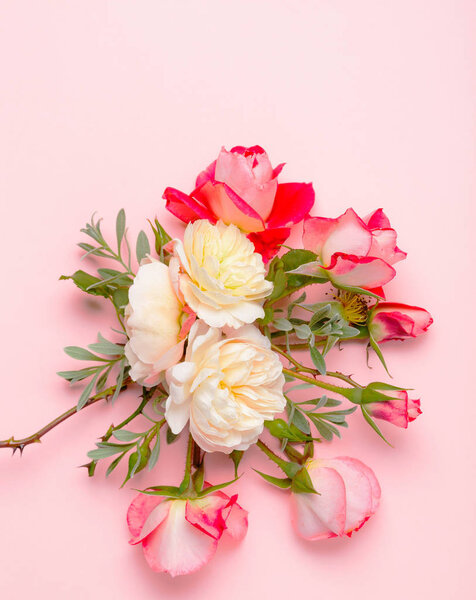 Festive flower composition on the white wooden background. Overhead view