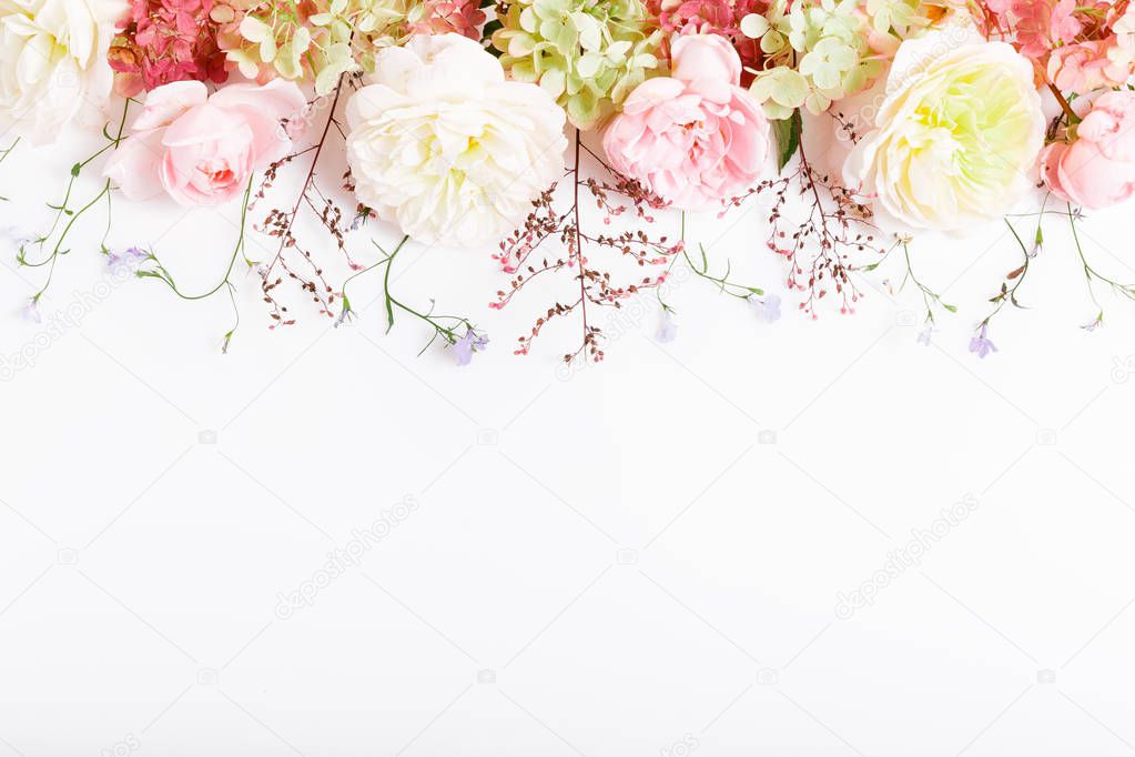 Festive flower composition on the white background. Overhead view