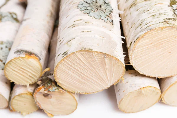 A pile of birch firewood on white background — Stock Photo, Image