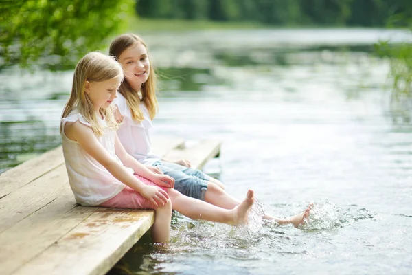 Two Cute Little Girls Sitting Wooden Platform River Lake Dipping — Stock Photo, Image