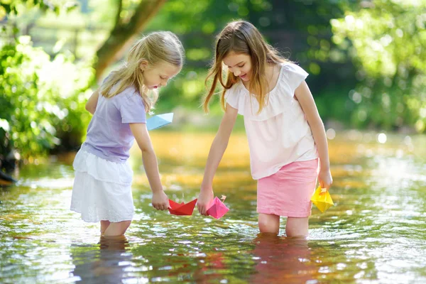 Two Little Sisters Playing Paper Boats River Warm Sunny Summer — Stock Photo, Image